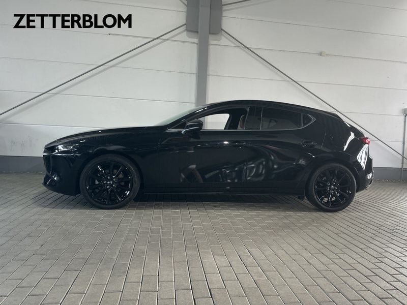 Mazda 3 bild 2