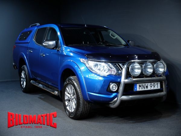 Mitsubishi L200 DC 2,4D AUT 4WD PERFORMER NAV SKINN KÅPA FRONTB V-HJUL - 2016